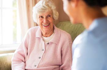An elderly women with her home carer