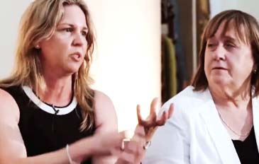A photo of two ladies talking