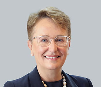 Portrait of Lucinda Brogden smiling at the camera