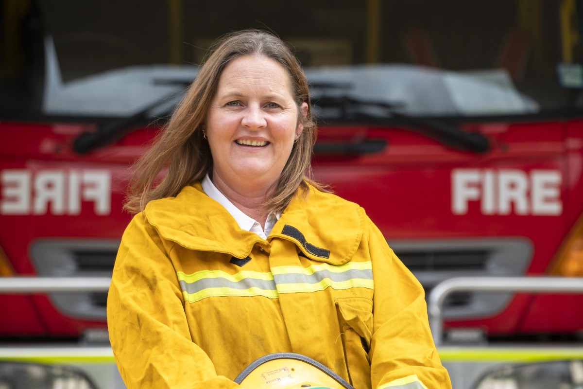 Tammy Meyers standing in front of a CFA firetruck