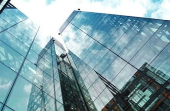 photo of exterior of skyscraper glass windows