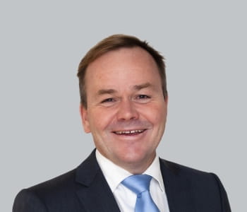 Portrait of Adam Vise smiling at the camera