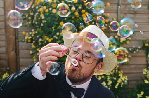 Man blowing bubbles