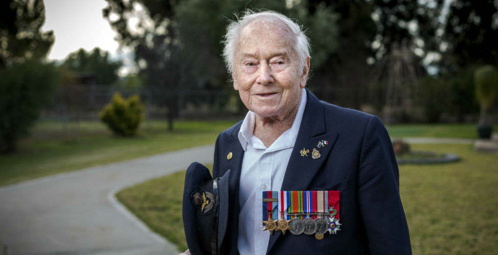 Phil Elger wearing his war medals