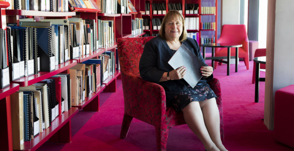 Maryanne Diamond sitting in a library