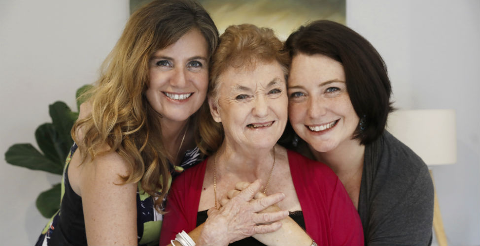 Support worker Melissa, with mother Narelle and sister Leeanne