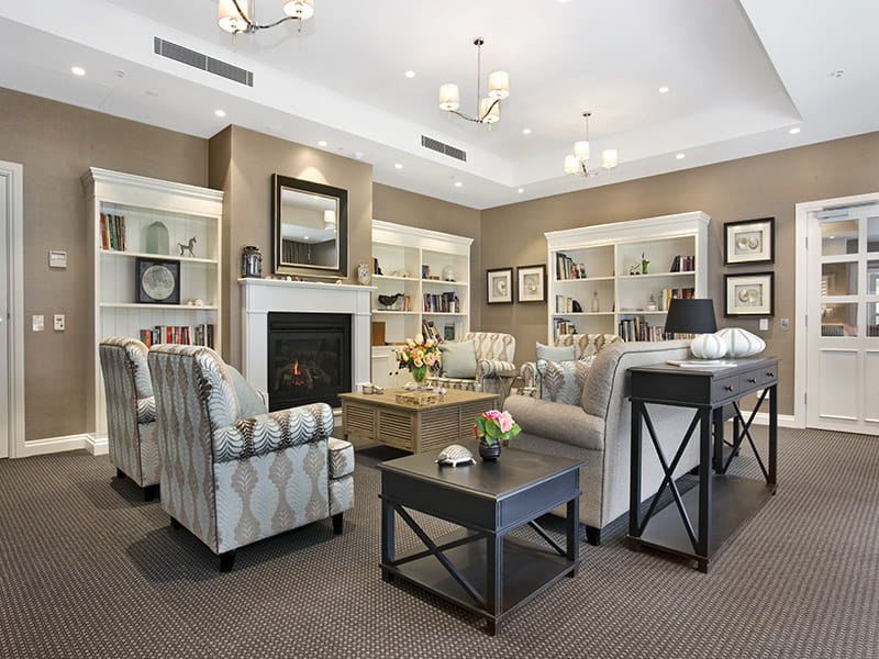 Room with fireplace and 4 lounge chairs