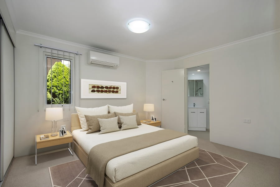 Crisp modern bedroom and ensuite