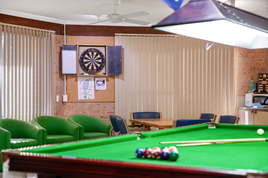 Activities room with a billiards table and dart board