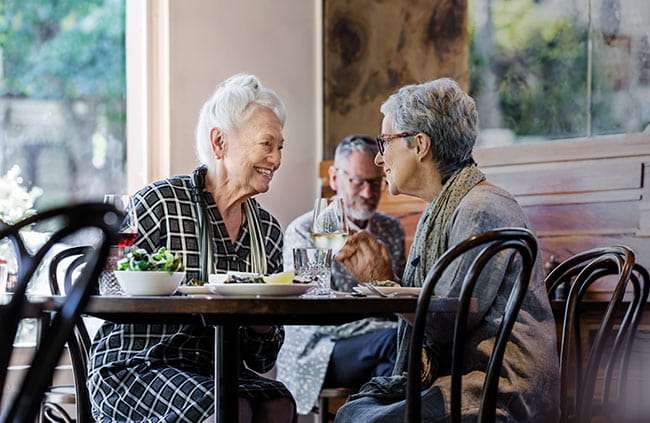 Ladies chatting in cafe