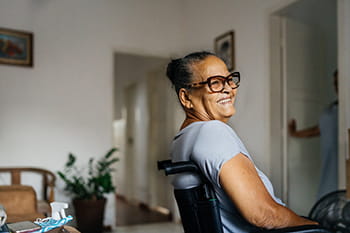 Smiling woman in wheelchair