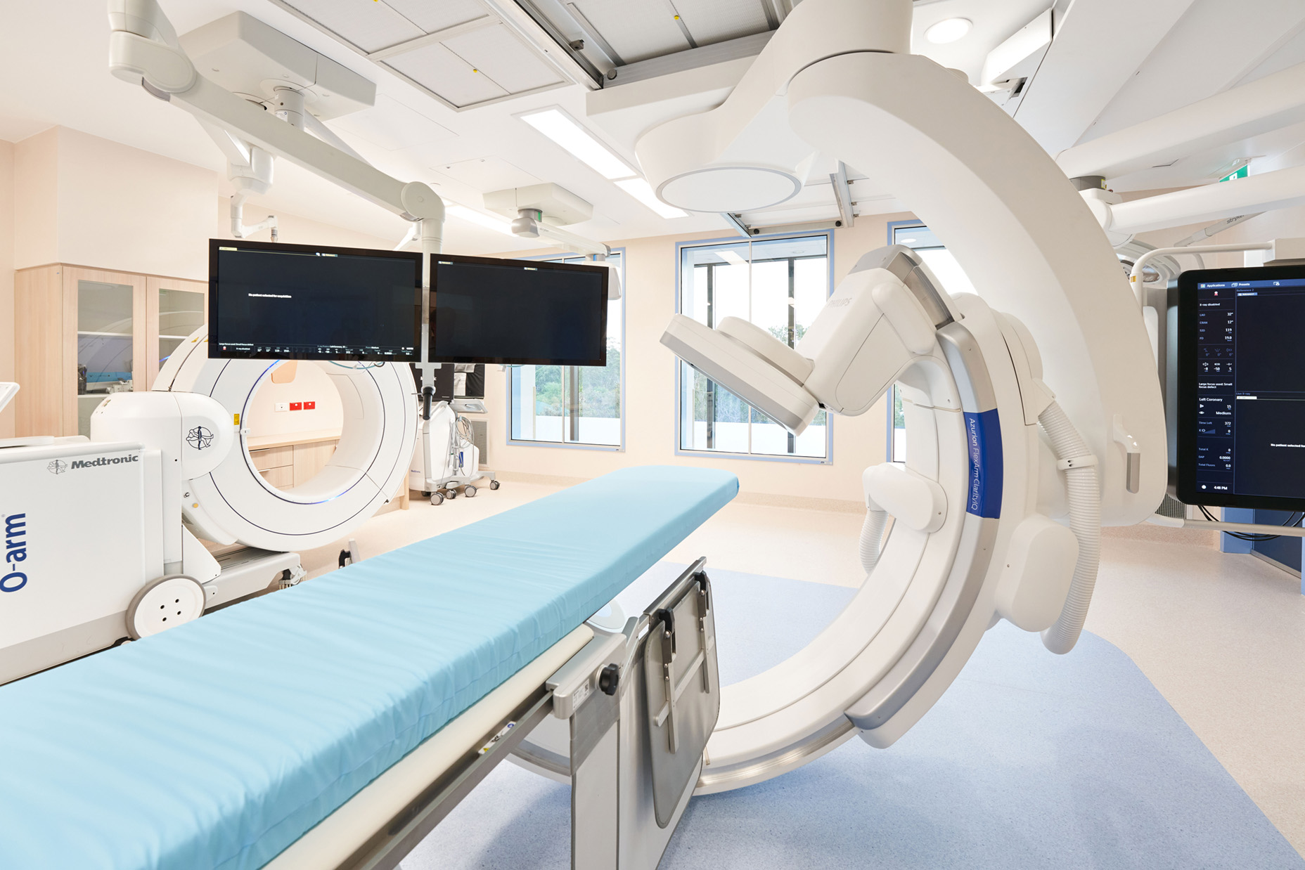 pristine hospital imaging equipment in a well lit procedure room