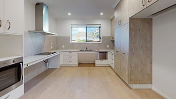 A picture of a white kitchen