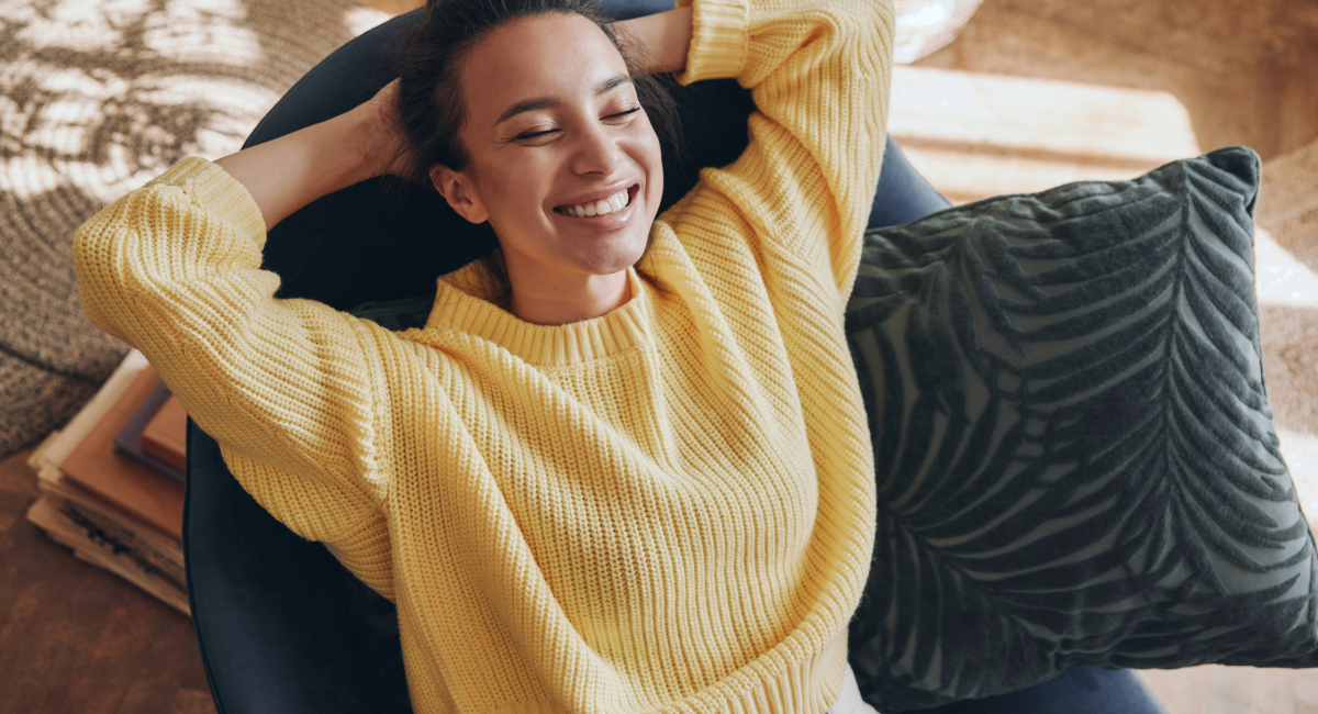 A young woman lying back and relaxing