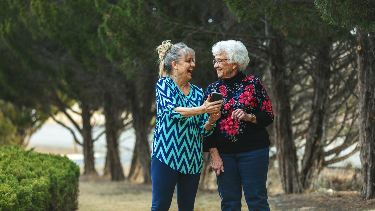 Older women walking and talking