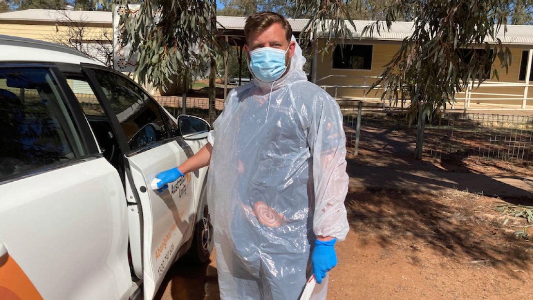 Luke Driscoll in PPE gear in Wilcannia