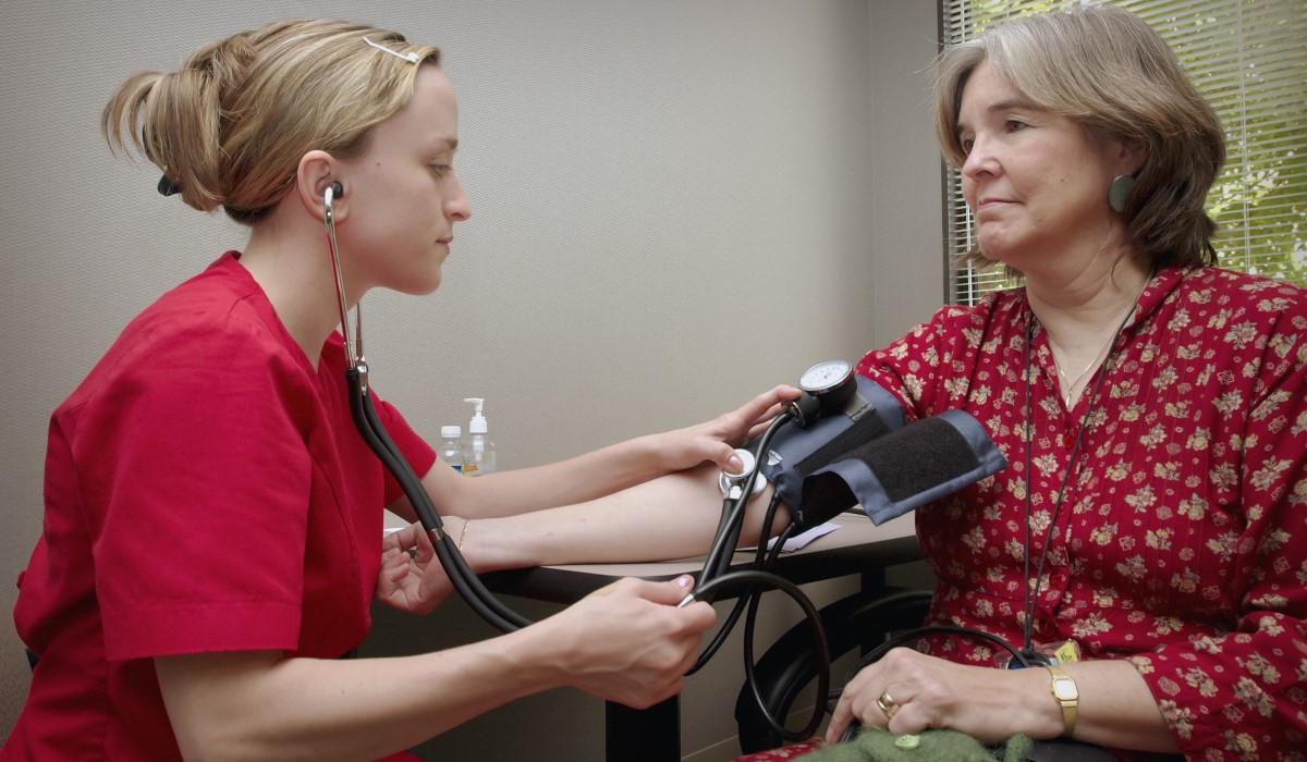 Older woman getting her blood pressure checked