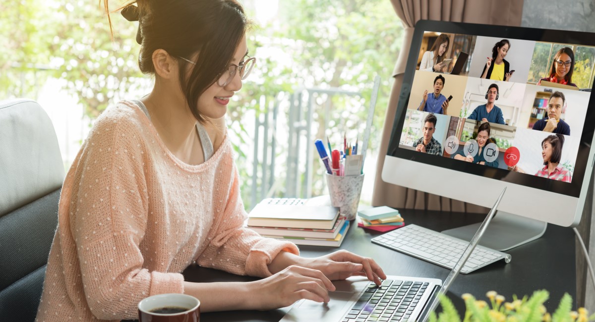 Woman working from home in an online meeting