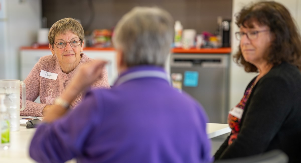 Carers laughing together
