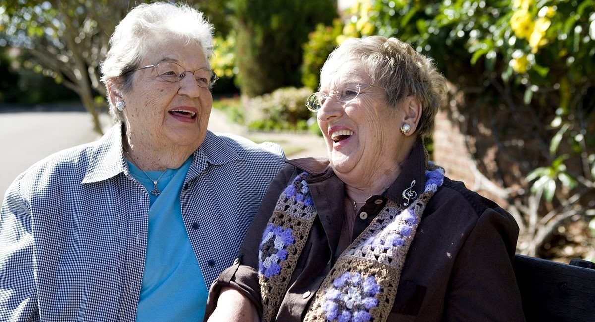 Two older women laughing