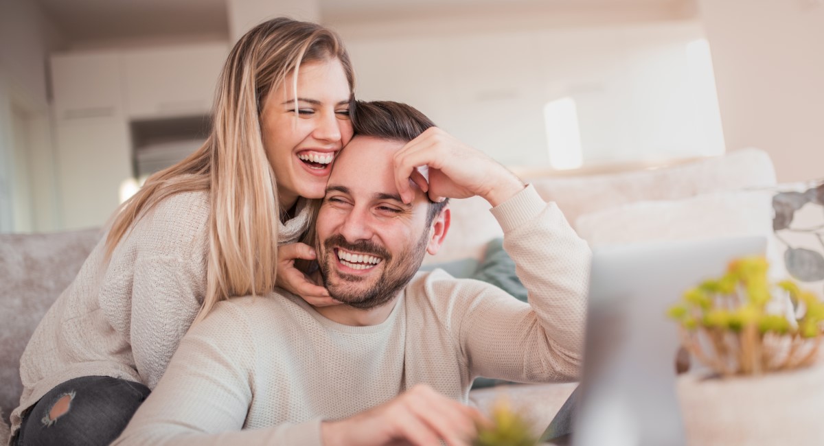 Man and woman couple laughing