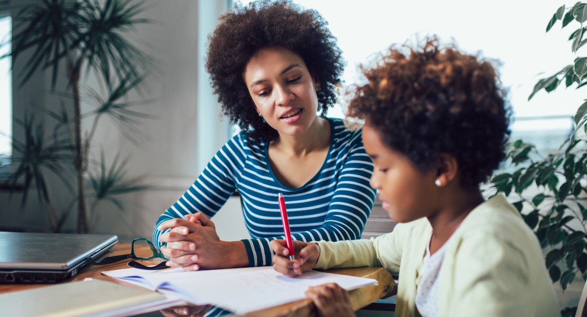 Mother and son doing school homework