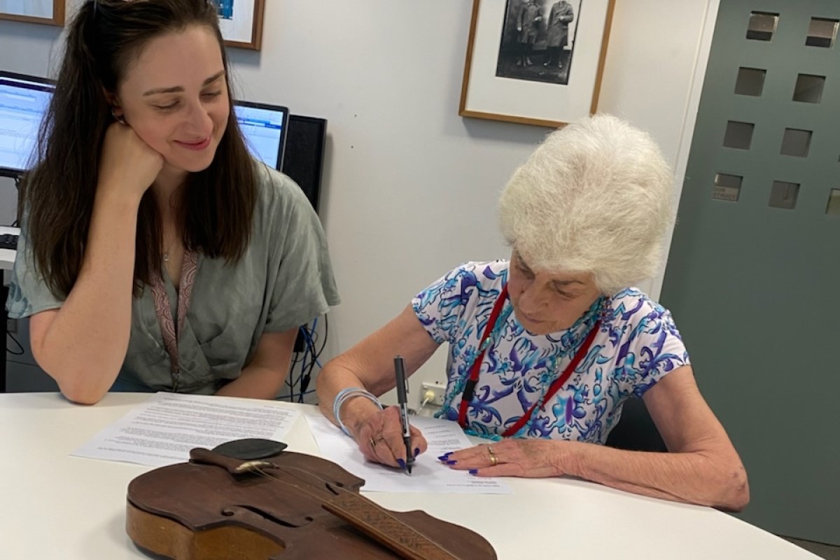 Merrilyn Vaisey donating the violin to the War Memorial