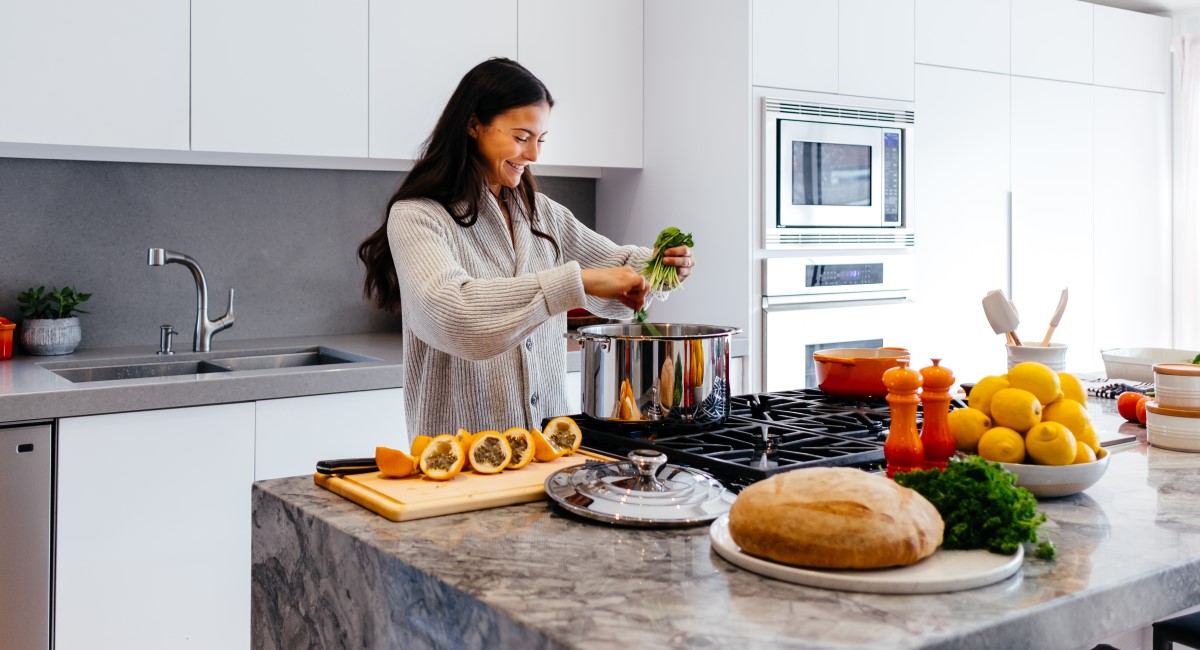 Woman cooking in kitchen