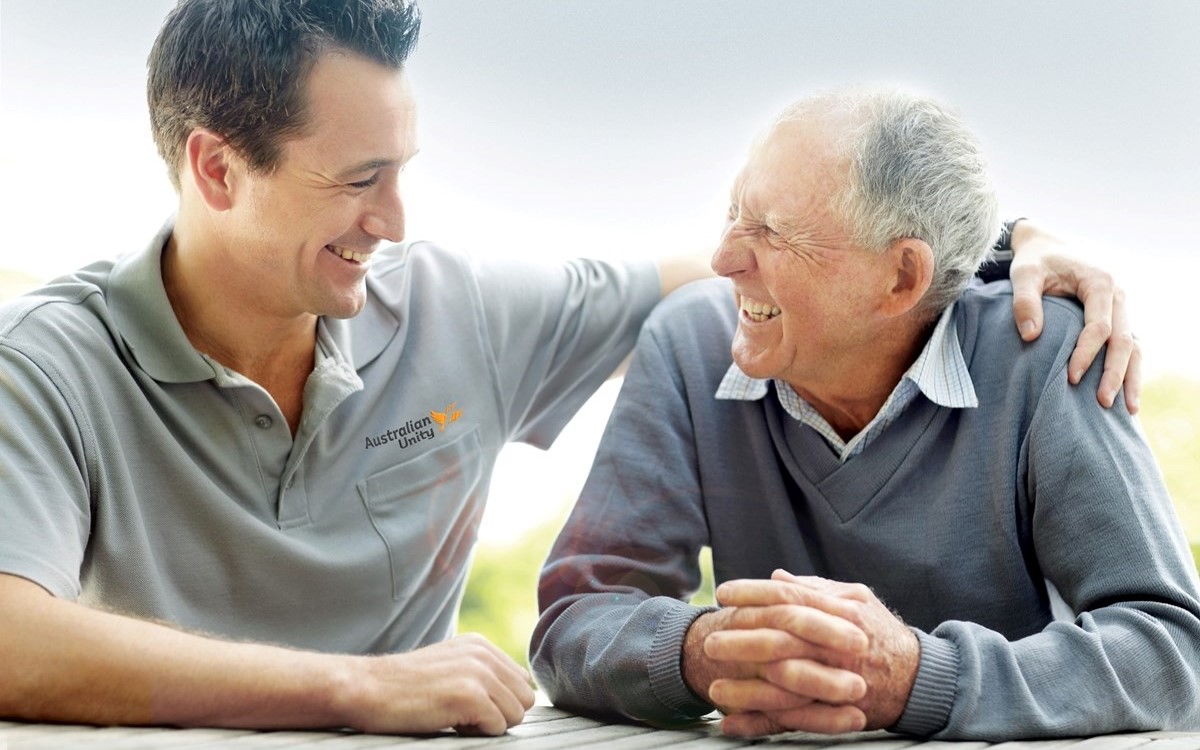 Australian Unity care worker with smiling older man