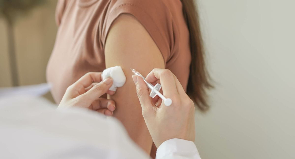 Someone receiving a vaccine