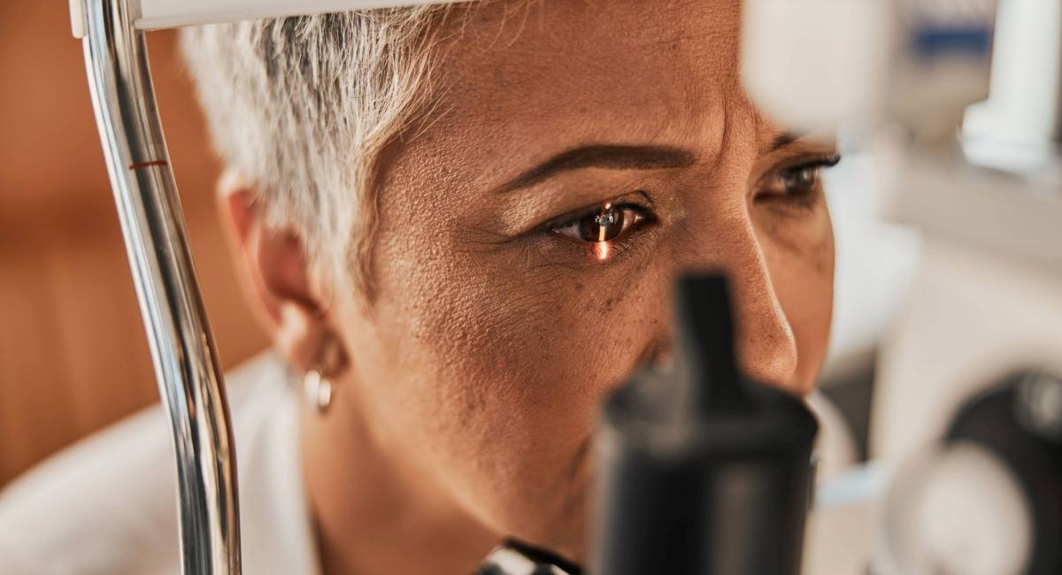 A woman receiving an eye test