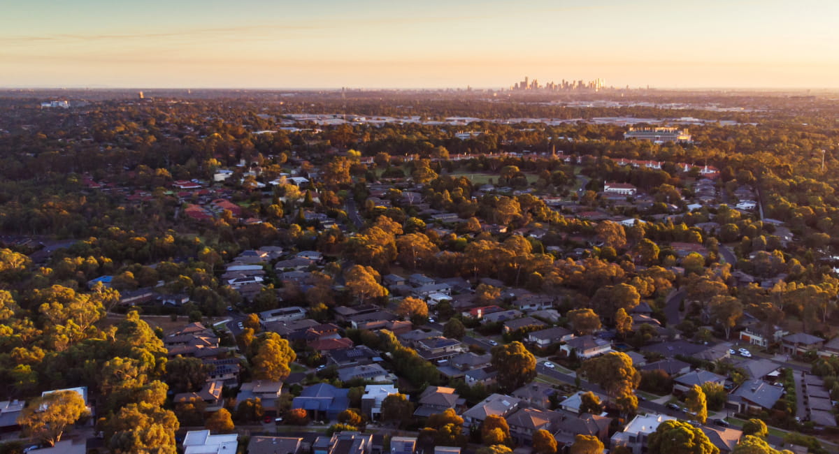 overlooking suburbs with a city in the distance