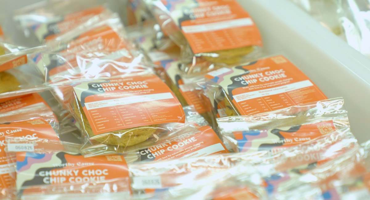 A box full of Worthy Cause cookies