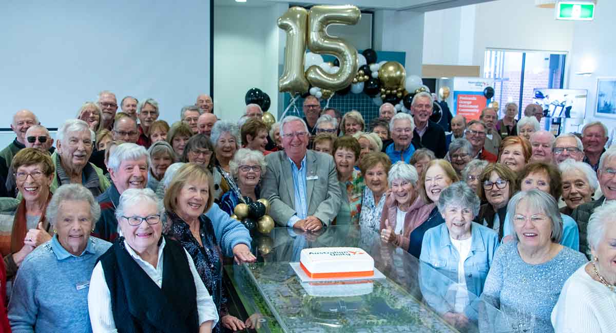 Residents of the Peninsula Grange Retirement Community celebrate the community's 15th birthday.