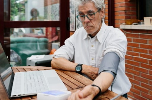 Older man getting his blood pressure checked