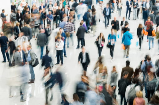A crowd of people walking